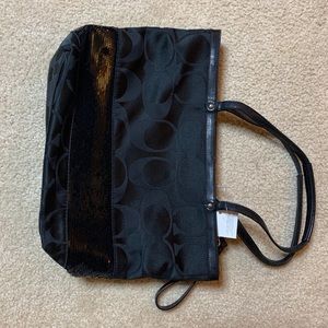 Black coach purse with sequin bottom section